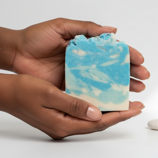 Black woman holding blue Hawaiian soap