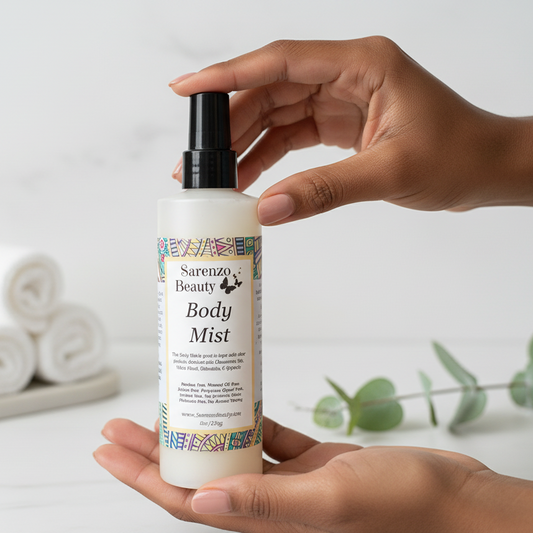 Black woman holding body mist spring