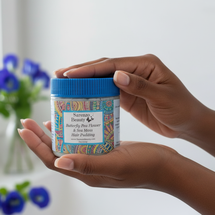 Black woman's hands holding hair pudding jar